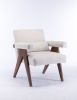 Accent chair, KD rubber wood legs with black finish. Fabric cover the seat. With a cushion.Cream