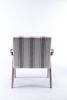 Accent chair, KD rubber wood legs with black finish. Fabric cover the seat. With a cushion.Grey Stripe