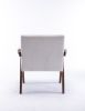 Accent chair, KD rubber wood legs with black finish. Fabric cover the seat. With a cushion.Cream